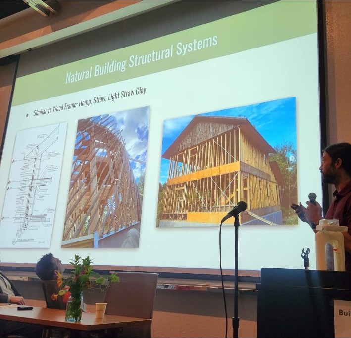 Presenter describing natural building structural systems